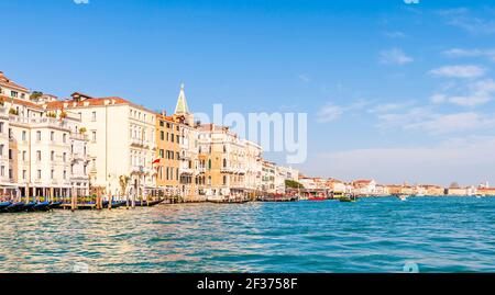 vaporetto station on the Grand Canal and in the distance the campanile of St. Mark's Square, Venice, Italy Stock Photo