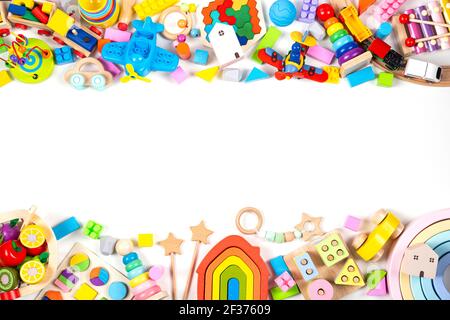 Baby kids toy frame. Colorful educational toys on white background. Top view, flat lay, copy space for text Stock Photo