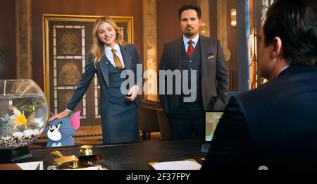 USA. Michael Pena and Chloe Grace Moretz in a scene from the ©Warner Bros  new film: Tom & Jerry: The Movie (2021). Plot: Adaption of the classic  Hanna-Barbera property, which reveals how