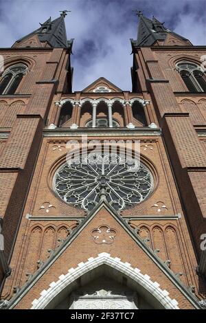 Sweden, Schweden; Uppsala Cathedral - Exterior; Dom zu Uppsala - Aussenansicht; Facade with two towers and rose window. Die Fassade mit zwei Türmen. Stock Photo