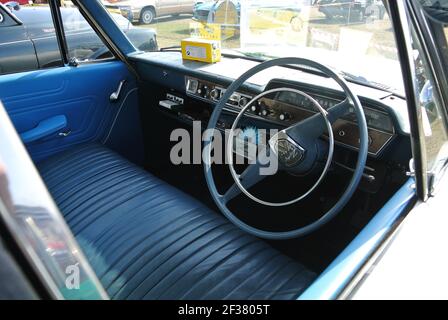 The front interior of a 1965 Ford Zephyr parked up on display at the English Riviera classic car show, Paignton, Devon, England, UK. Stock Photo