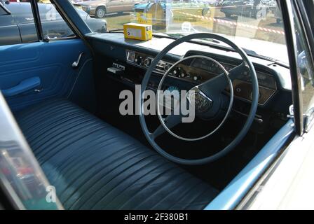 The front interior of a 1965 Ford Zephyr parked up on display at the English Riviera classic car show, Paignton, Devon, England, UK. Stock Photo