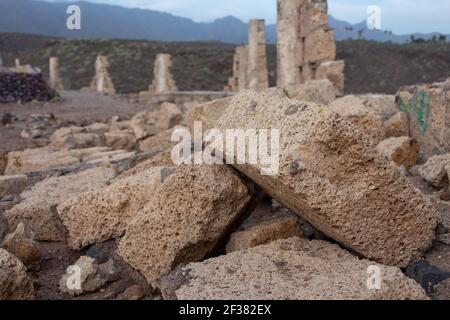 Close up of briks fallen from a wall in contruction after the strong calima wind. Stock Photo