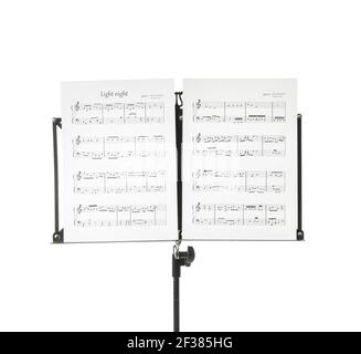 Note stand with music sheets on white background Stock Photo