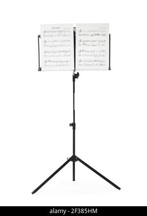 Note stand with music sheets on white background Stock Photo