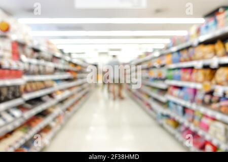 Blur image of aisle in supermarket with customers - for background Stock Photo