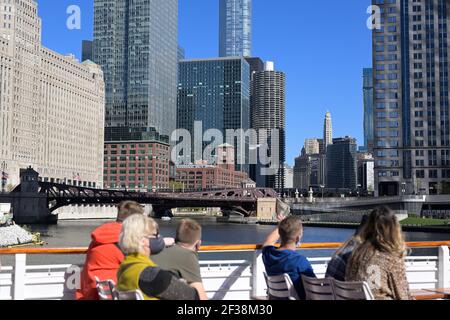 Tourists on a river cruise exploring the architecture along the loop, Chicago IL Stock Photo