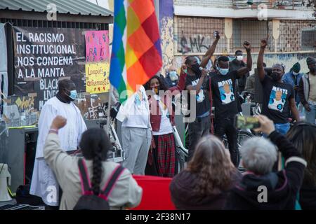 Madrid, Spain. 15th Mar, 2021. Protest in memory of Mame Mbaye on the 3rd anniversary of her death.Dozens of compatriots and neighbors have joined the protest against institutional racism and in memory of the mantero who died in 2018. Mame Mbaye died of a heart attack while she fled from the police in the center of Madrid while selling CD'S. (Photo by Fer Capdepon Arroyo/Pacific Press) Credit: Pacific Press Media Production Corp./Alamy Live News Stock Photo