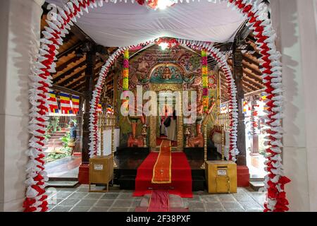 The colourful entrance to the Hindu shrine within the Kataragama Temple (devale) at Kandy, Sri Lanka. This temple has both Hindu and Buddhist sections Stock Photo