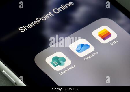 Microsoft OneDrive mobile app icon is seen on a smartphone. OneDrive is ...