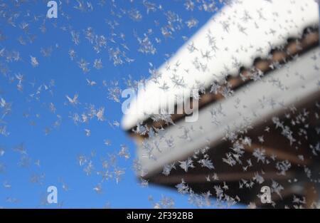 Frosty natural pattern on winter window glass Stock Photo