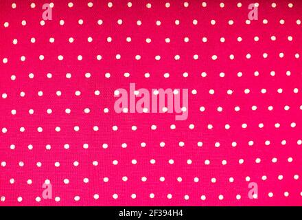 Pink polka dot fabric for polka dots on light pink background Stock Photo