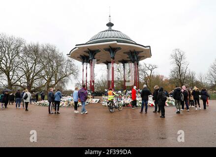 London, UK. 15th Mar, 2021. People pay tributes at the bandstand on Clapham Common to mourn for Sarah Everard in London, Britain, on March 15, 2021. A serving Metropolitan police officer on March 13 appeared in court in London after being charged with the kidnap and murder of a 33-year-old woman. Wayne Couzens, 48, was arrested after Sarah Everard, a marketing executive, went missing while walking home from a friend's apartment in south London on March 3. Credit: Xinhua/Alamy Live News Stock Photo