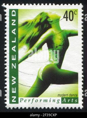 NEW ZEALAND - CIRCA 1998: stamp printed by New Zealand, shows Dancing Young Girl, circa 1998 Stock Photo