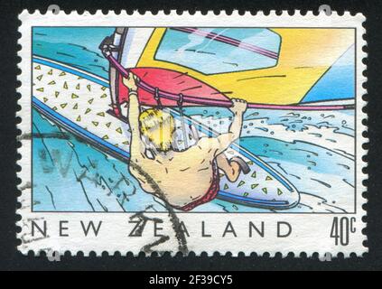 NEW ZEALAND - CIRCA 1989: stamp printed by New Zealand, shows The sea, Windsurfing, circa 1989 Stock Photo