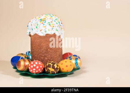 Paska Easter cake and painted eggs of pysanka on a blue background with place for text copy space. Traditional holiday photo. Stock Photo