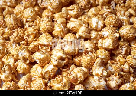 Popcorn with caramel close-up. Sweet popcorn for movies Stock Photo