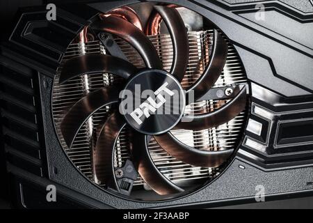 St.Petersburg, Russia - February 2, 2021: Palit GPU cooler, close-up photo. This fan is mounted on a video card to cool the GPU and surrounding compon Stock Photo