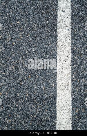 White stripe on road, line marking on an asphalt road. Stock Photo