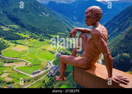 View of the statue of the Thinker that is suspended above the Valira valley above the city of Canillo. Canillo Parish - Andorra Stock Photo