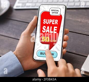 Unrecognizable businessman shopping online while working in office Stock Photo
