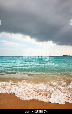 Stormy clouds over a tropical beach. Stock Photo