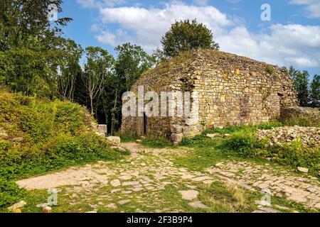 Lanckorona, Poland - August 27, 2020: Ruins of medieval royal Lanckorona Castle in historic royal open-air museum town in Beskidy mountains of Lesser Stock Photo