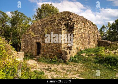 Lanckorona, Poland - August 27, 2020: Ruins of medieval royal Lanckorona Castle in historic royal open-air museum town in Beskidy mountains of Lesser Stock Photo