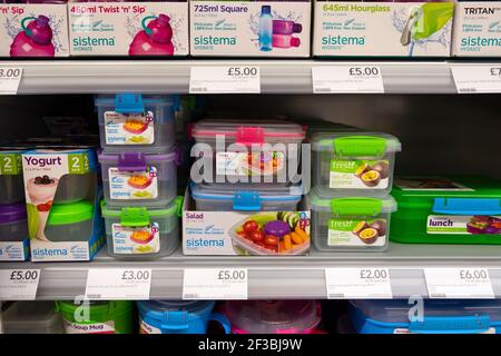 Colourful plastic Sistema Klip It kitchen containers for sale on display on a supermarket shelf in  UK   KATHY DEWITT Stock Photo