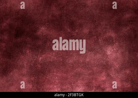 Red burgundy wall grunge background or texture Stock Photo