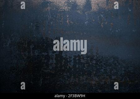 Worn out rusted black metal texture grunge background Stock Photo