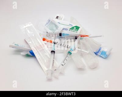 Stockholm, Sweden - January 19, 2021: The amount of medical waste during the Covid-19 pandemic has increased. Discarded syringes, wrappings and packag Stock Photo