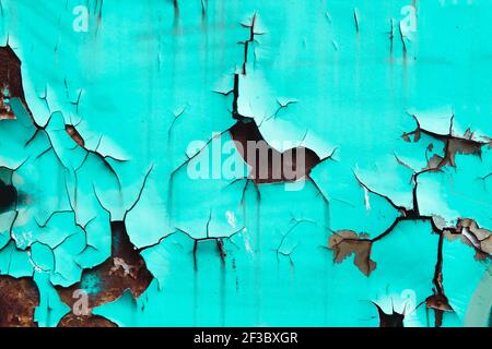 Old corroded metal with turquoise peeling paint, grunge background or texture Stock Photo