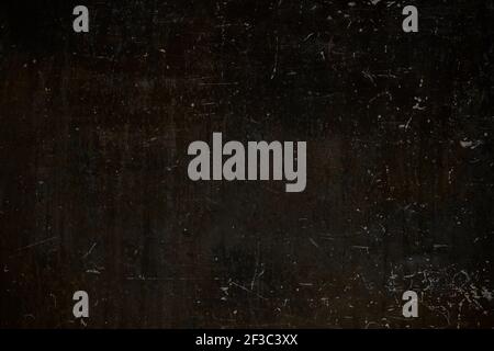 Old dark scratched metal texture grunge background Stock Photo