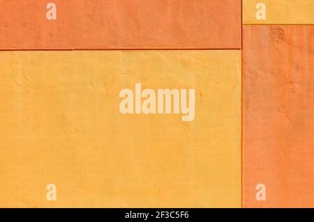 Yellow and orange painted wall, geometric abstract background Stock Photo
