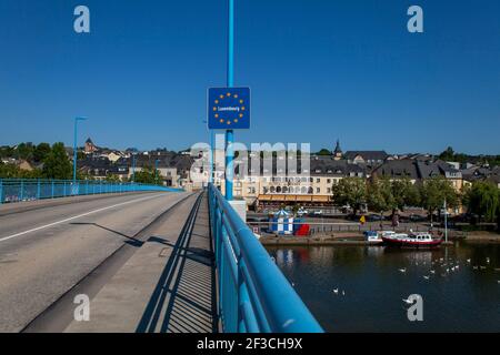 Luxembourg: overview of the town of Remich from the bridge across the River Moselle, border between Luxembourg and Germany. Luxembourg road sign with Stock Photo