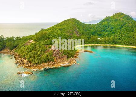 Aerial sunset landscape of the tropical Mahe Island and beautiful lagoons, Seychelles