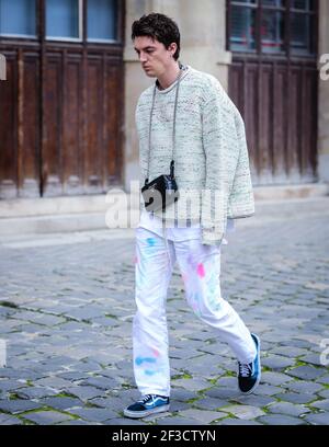 PARIS, France- March 3 2019: Men on the street in Paris. Stock Photo