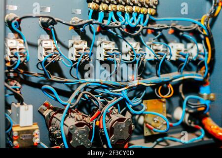 Inside electrical panel , wires cables connections Stock Photo