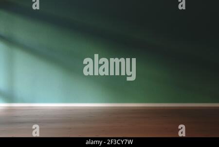 Place for your product. 3D rendering of empty room with wooden floor for advertisement, lit from left side. Stock Photo