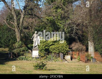 Potsdam, Germany. 03rd Mar, 2021. A figure of Jesus with outstretched arms stands on the grounds of the Old Cemetery. The cemetery was laid out on the orders of Friedrich Wilhelm II and opened in 1796 and is one of the oldest municipal cemeteries in the city. In the early 1980s, the approximately ten-hectare area was redesigned to resemble a park. Credit: Soeren Stache/dpa-Zentralbild/ZB/dpa/Alamy Live News Stock Photo