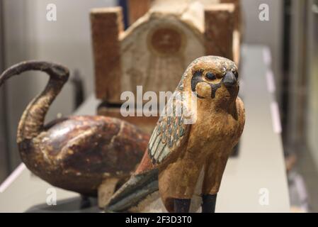 Egyptian wooden statues depicting the gods of the ibis and falcon animals Stock Photo