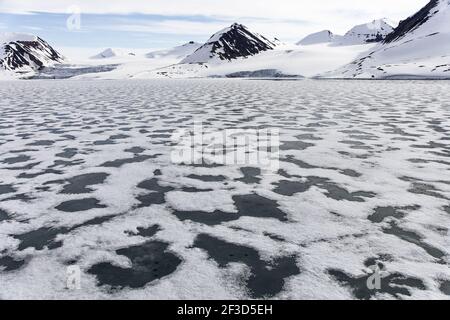 Sea Ice and mountainous landscape - Late SpringSvalbard (Spitsbergen) Norway LA003644 Stock Photo