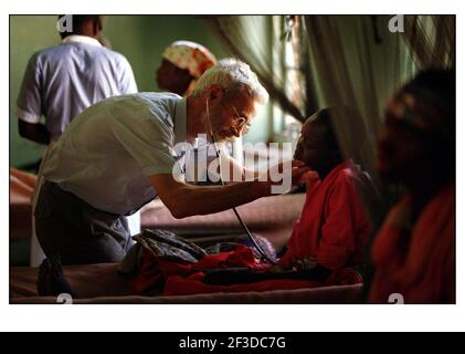Dr. Sandie Logie treats a young child with aids related pneumococcal meningitis in St. Francis Hospital in Zambia. Stock Photo