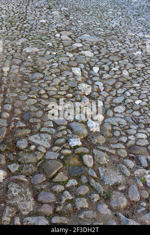Old stone paved road in Gerona, Catalonia, Spain Stock Photo