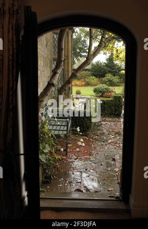 View through a doorway into a garden, England, UK Stock Photo