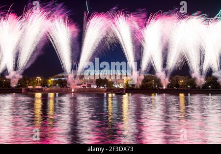 Fireworks over Moscow big sports arena (Stadium) Luzhniki Olympic Complex -- Stadium for the 2018 FIFA World Cup in Russia Stock Photo