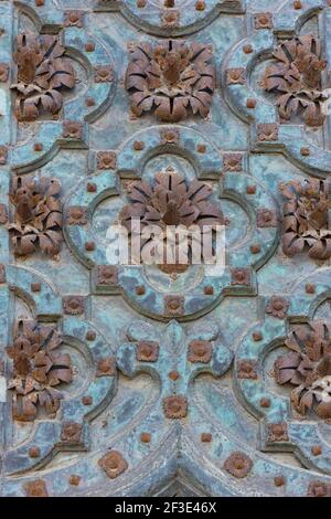 Metal door with patina of the passage of time in spain Stock Photo
