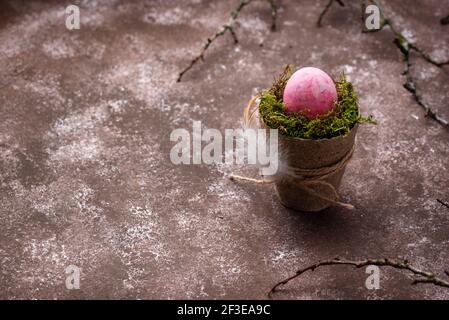 Red Easter egg painted with beetroot Stock Photo