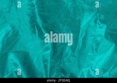 Green glowing textured background, selective focus, empty space for text Stock Photo